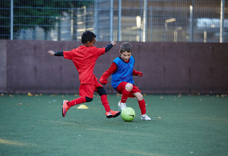 Boys playing football