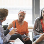 Westway Trust colleagues in a group discussion