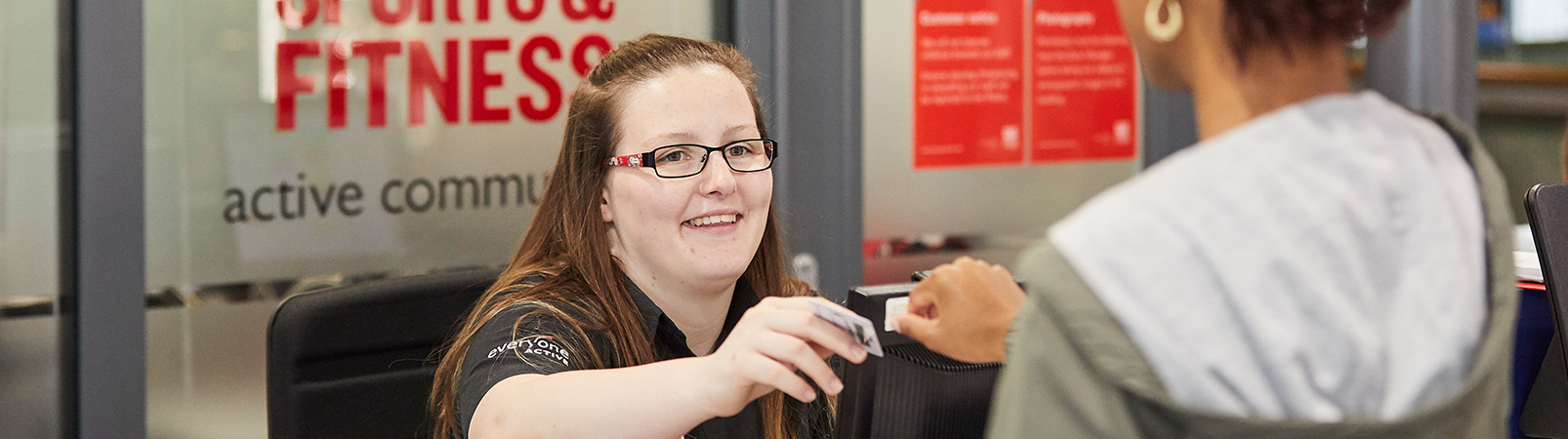 Receptionist at sports centre