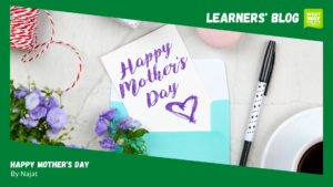 Image of a Happy Mother's Day note card and a pen with green learners' blog boarder