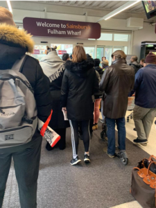 People queuing in the supermarket