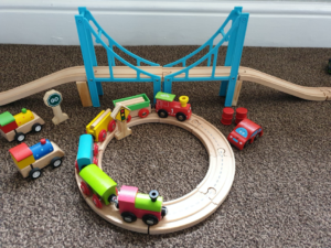 Wooden toy train and track set