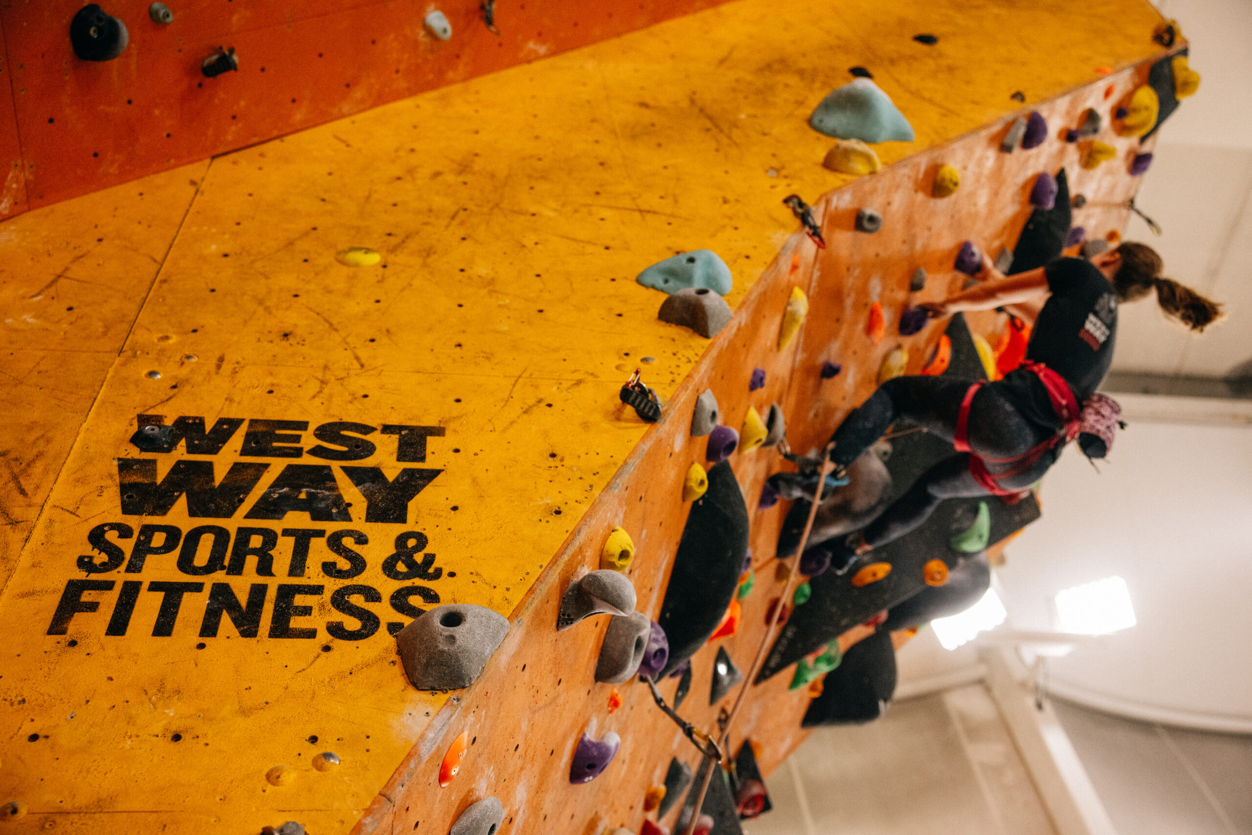 Person climbing wall