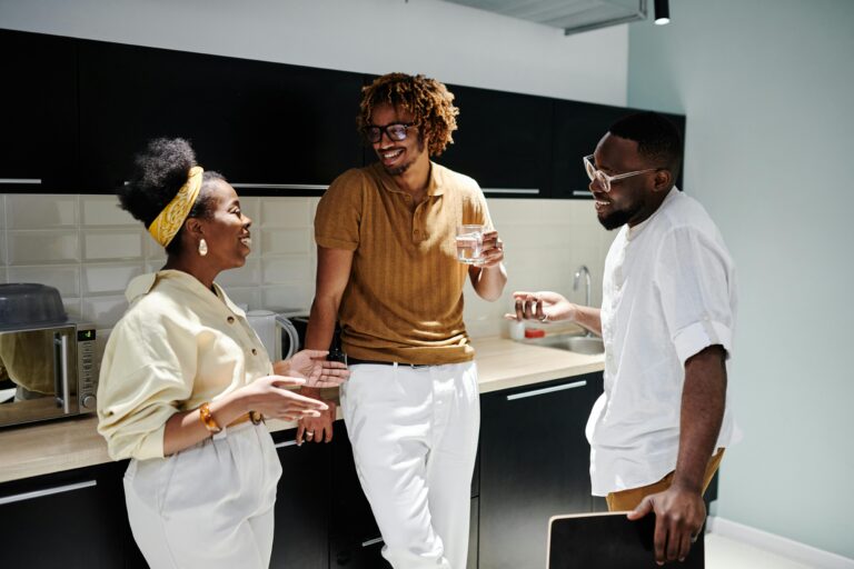 Three people in conversation