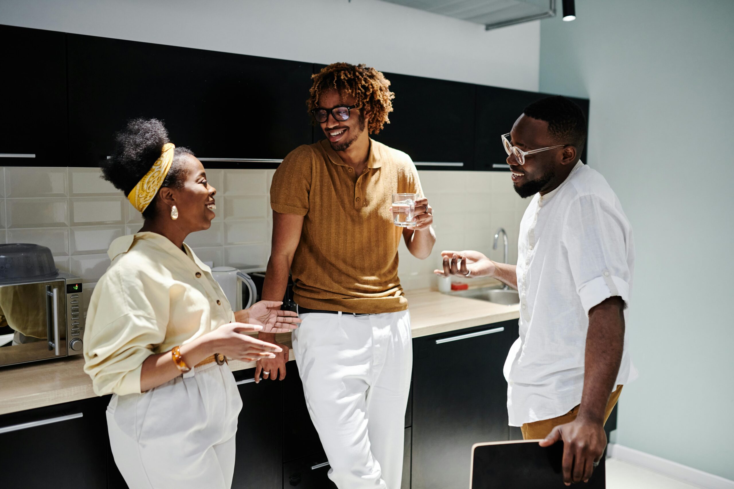 Three people in conversation