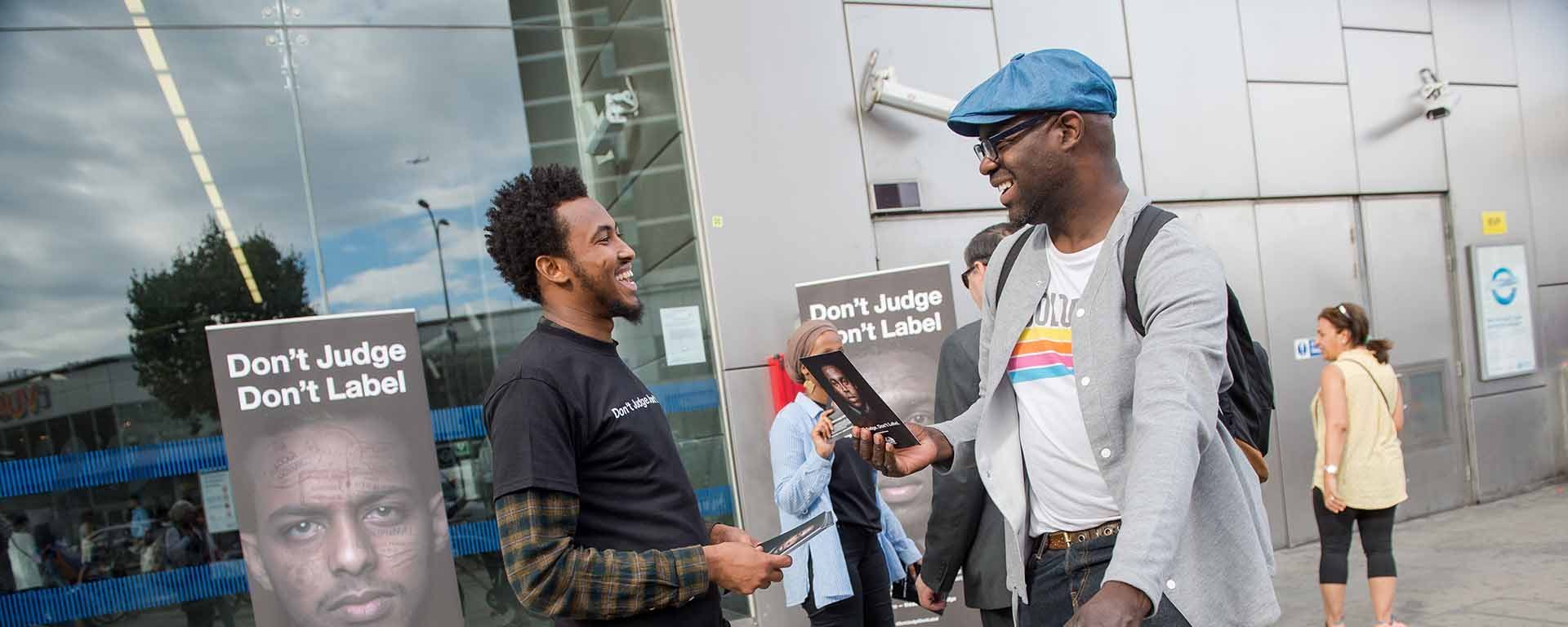 Anti Tribalism Movement team leafleting outside Shepherds Bush station